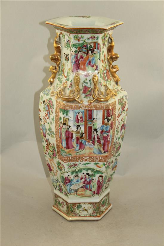 A Chinese Canton-decorated famille rose hexagonal baluster vase, mid 19th century, 44cm, slight restorations